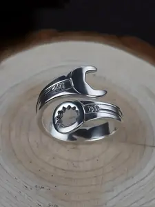 A unique open-ring jewelry piece in the shape of a wrench for men, Adjustable ring. It is suitable for daily wear, as a gift for parties, festivals, birthdays and anniversaries. It is a perfect gift for men during jewelry festivals and gatherings.