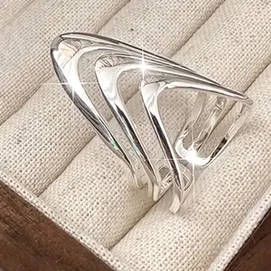 Silver 3 loop ring.