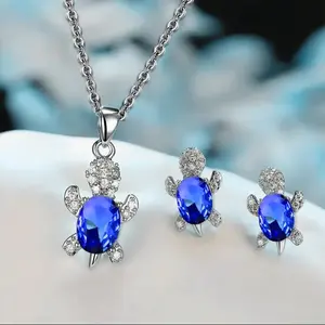 Women's silver-plated necklace and earrings three-piece set, light luxury fashion style, turtle-shaped design with multi-colored glass