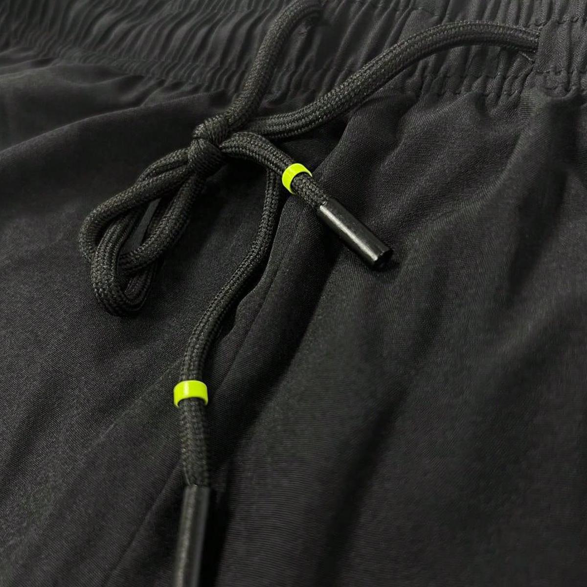 Pack of 4 men’s plus-size athletic shorts, loose fit, comfortable sports fabric, zippered pockets, solid color, slight stretch—ideal for night running, casual wear, beach trips, everyday commuting, and plus-size workwear.