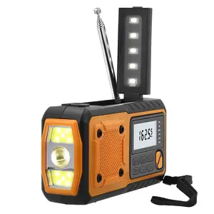 Lightweight, Portable, Multi-function Outdoor Emergency 4000mAh Solar-powered Hand-crank Radio Flashlight with AM/FM Radio, Powerful LED SOS Flashlight, and USB Phone Charging Support. Essential Survival Tool for Camping Disasters