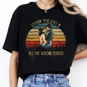 Bud And Sissy Looking For Love In All The Wrong Places Shirt, Retro 80s Country Movie Quote Tee, Vintage Romance Unisex T-Shirt, Cowboy Couple Gift