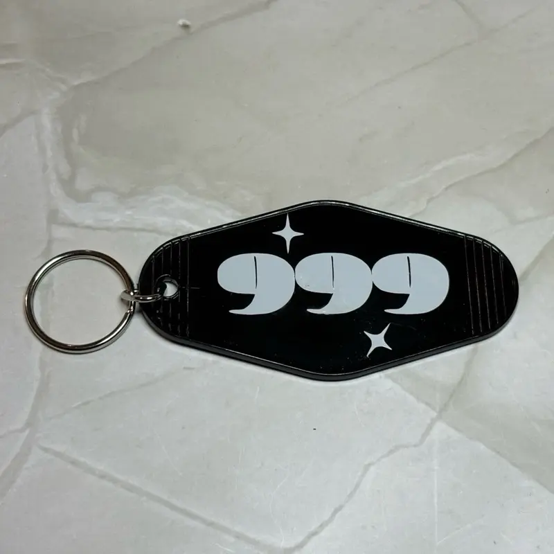 999 Angel Number Plastic & Vinyl black motel style keychain