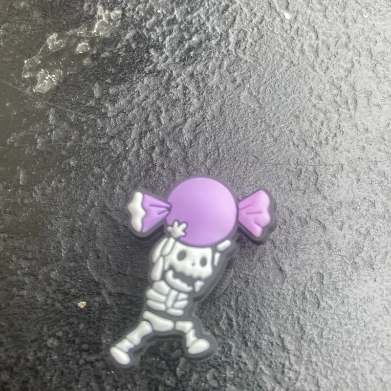 Skeleton Candy Running Croc Jiblet Charm with Purple Bow and Detailed Skeleton Design Footwear Shoe Decor