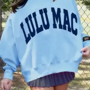Lulu Mac Light Blue Sweatshirt with Bold Lettering Design for Casual Wear