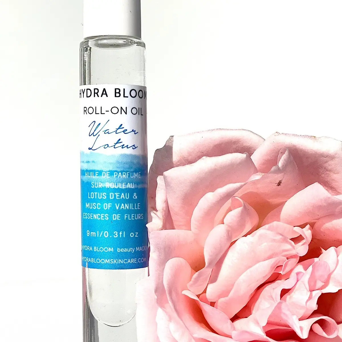 Blue Water Lotus + Vanilla Musk Roll-on Perfume by Hydra Bloom California . Hydrating Mood Enhancing Aromatherapy