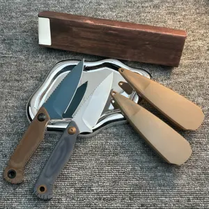 The 203 EDC fixed-blade knife features a compact design and a textured, non-slip handle, combining a stylish aesthetic with practical outdoor functionality.