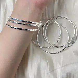 S999 Sterling Silver Women's "Seven Days of Good Luck" Bracelet — Handcrafted Interwoven Seven-Ring Chain, Classic Rolling-Ring Bangle Set (64cm)