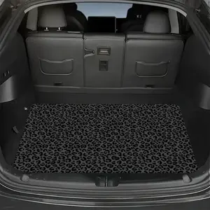 Universal Car Trunk Mat with a Black Leopard Print - a Breathable Polyester Mat Suitable for All Seasons, Designed for Suvs And Trucks. It Serves As a Decorative Accessory for And Auto Supplies