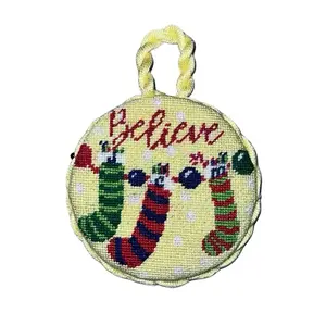 Handmade Needlepoint Believe 4” Circular Ornament with Grinch Design, Green Cord, Unique Craftsmanship for Holiday Decor