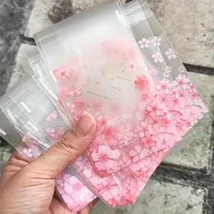 100 Sakura Transparent Matte Opp Gift Bags, Self-Seal Reusable Packaging for Weddings Parties Birthdays Tea Parties, Gift Decoration, 2.76x3.94 Inches, Compact Size