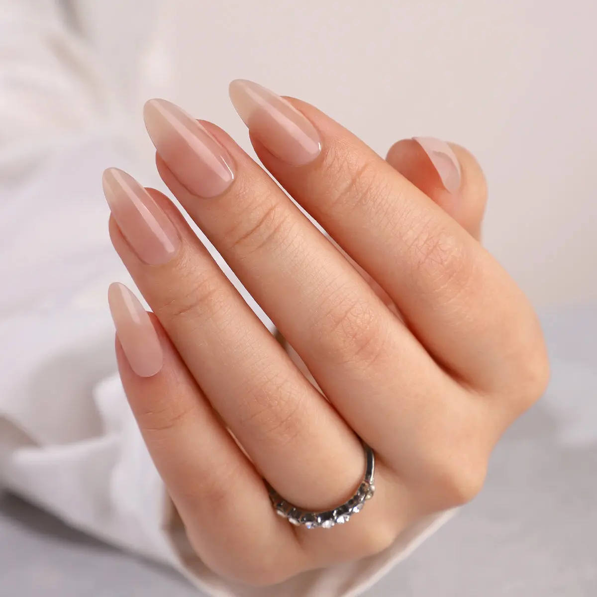 CurvLife Nailora long stiletto nail art press on nails solid nude glossy shiny 2 week wear