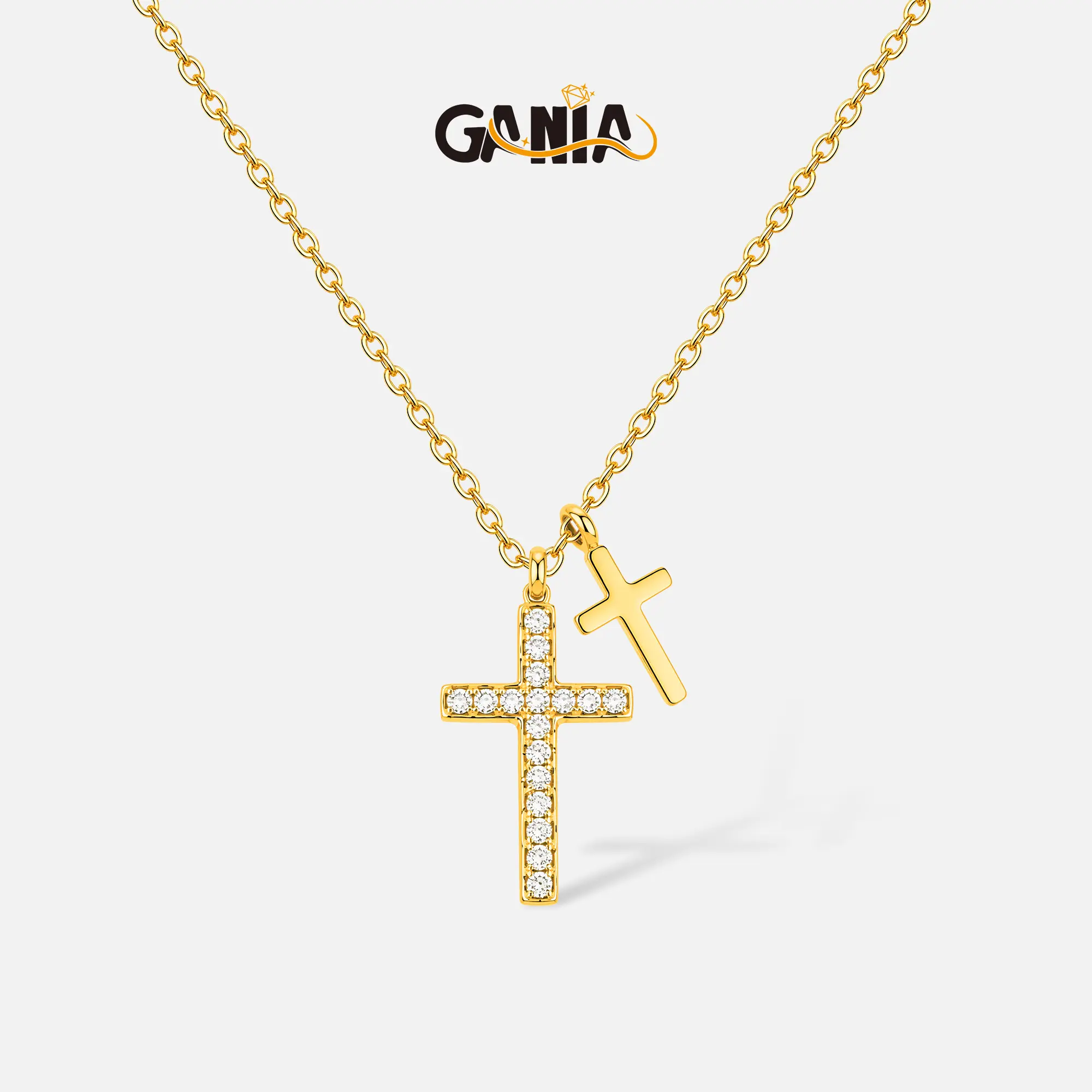 GANIA Layered Double Cross Necklace with sparkling accents on pendants. Featuring dainty skin-friendly plated chains, this minimalist stylish jewelry fits daily looks, dates and parties, and serves as a delicate thoughtful gift for women on all holidays.