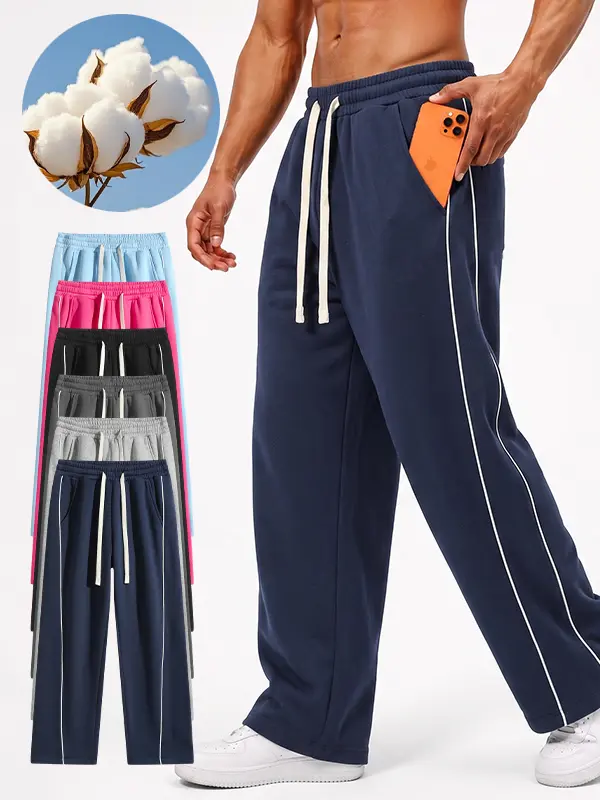 Men's breathable blended-fabric sweatpants featuring contrasting trim and curved stripe detailing; designed with a drawstring waistband and a relaxed, draped fit, these straight-leg sweatpants are suitable for everyday wear.