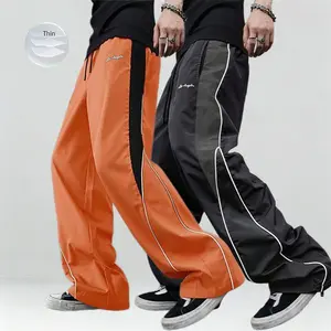 2-piece set - men's black and color-block sports pants with white side stripes and embroidered design, casual fitness wear, loose athletic trousers, stylish streetwear running pants, drawstring waistband, straight cut, polyester fiber material - men's pan