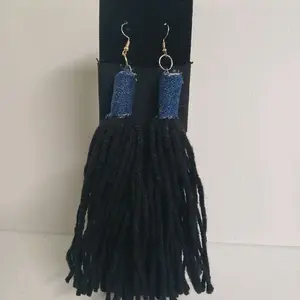Black Tassel Earrings with Blue Denim Top for Stylish Accessory