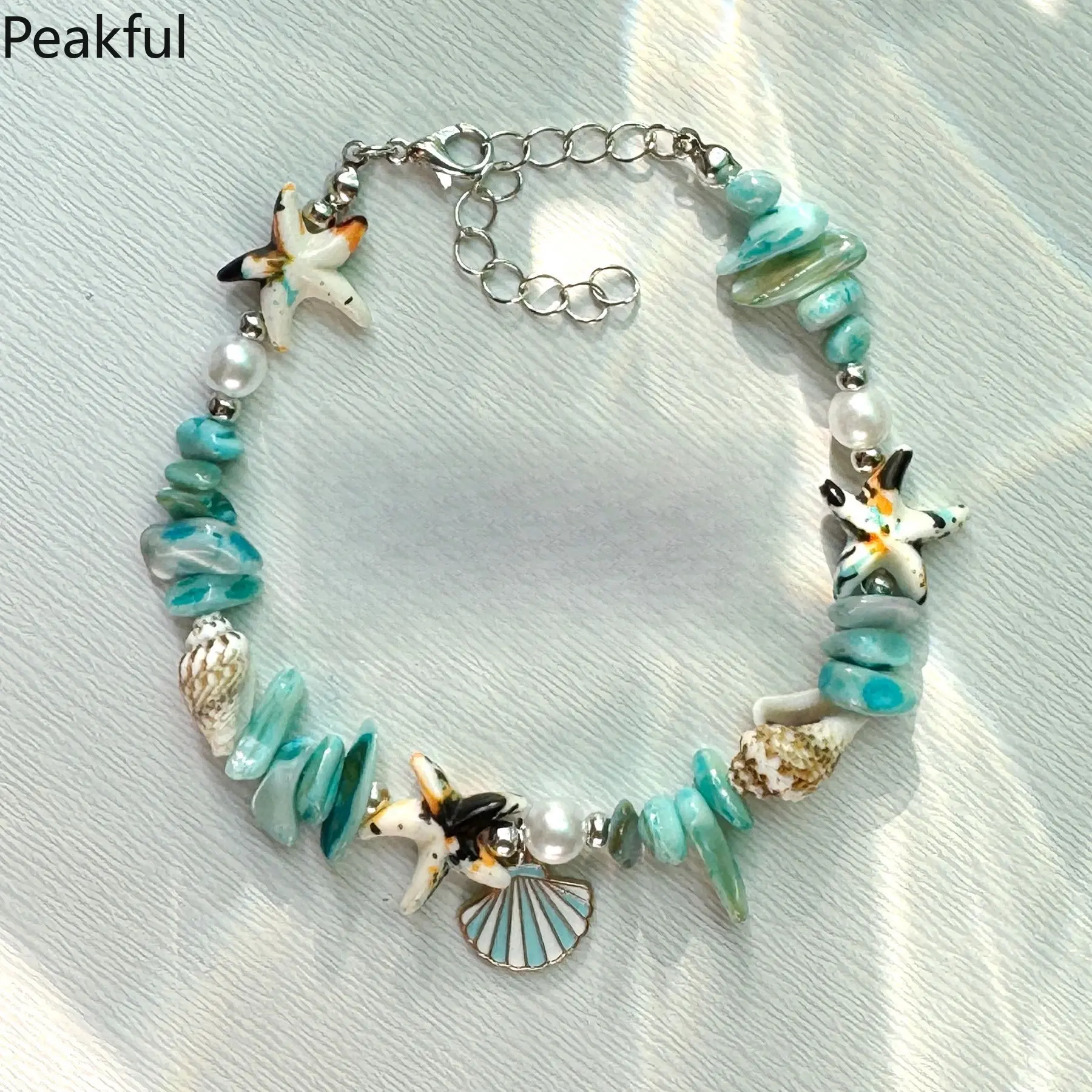 Handmade Beach Jewelry, popular aquamarine accessories with conch and shell charms. Delicate pearl embellishments and classic coastal design, comfortable to wear, great for summer outfits, tropical travel and daily fashion matching.