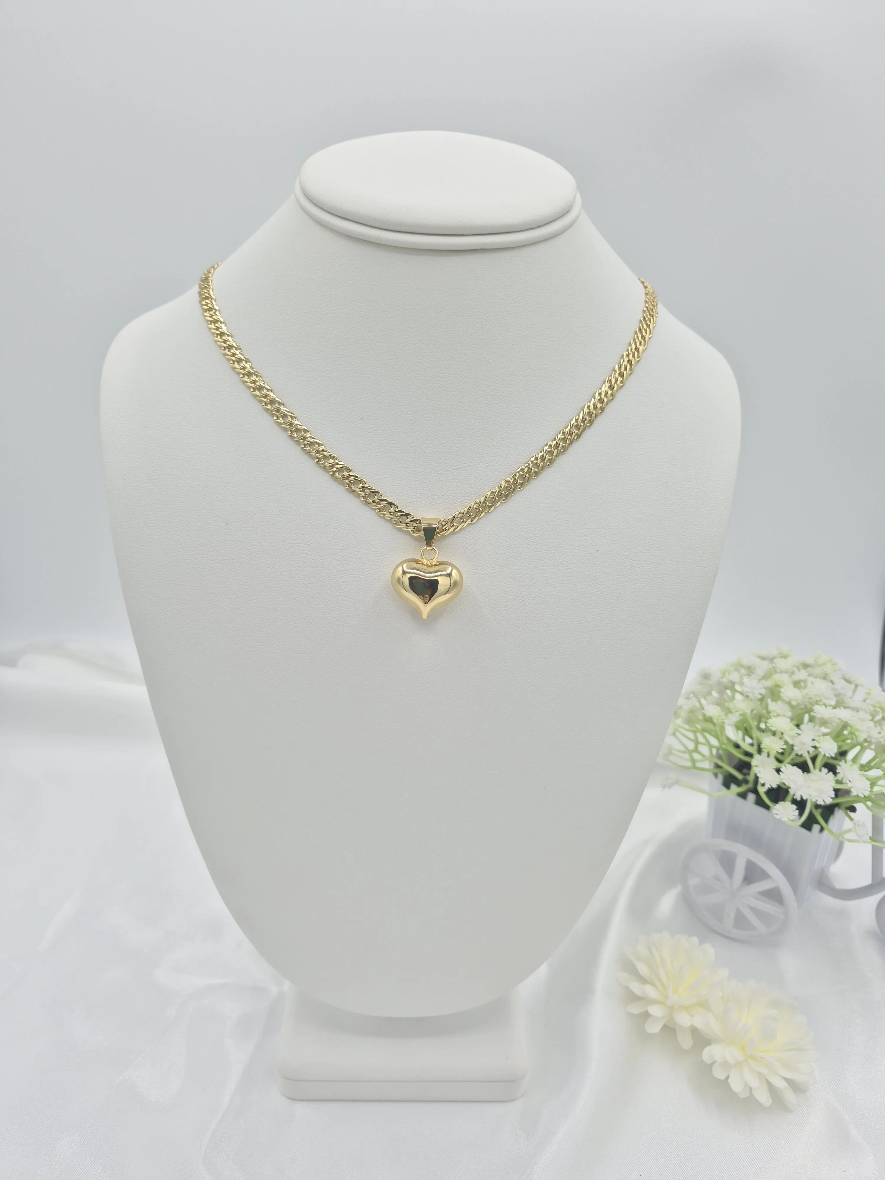 14k gold plated chain with puffy heart charm. 14k gold plated chain with puffy heart charm.