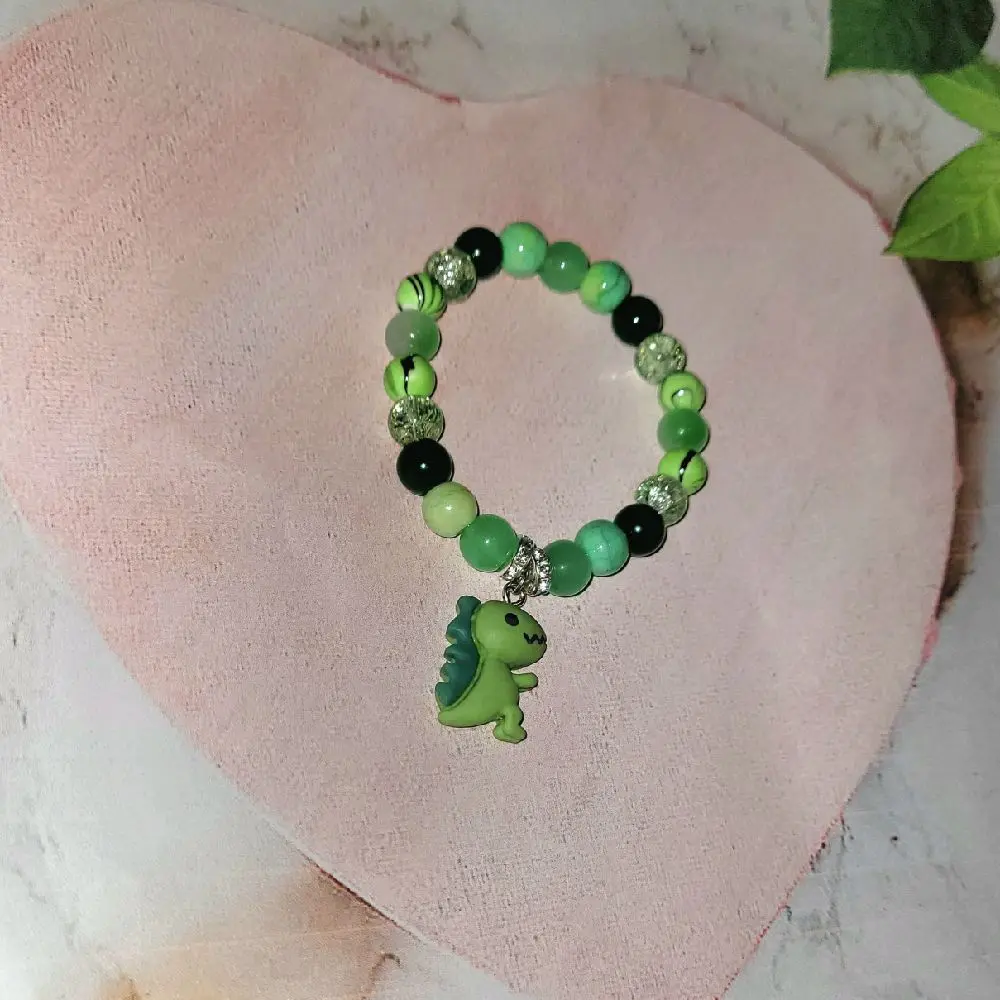 Green dino charm bracelet
