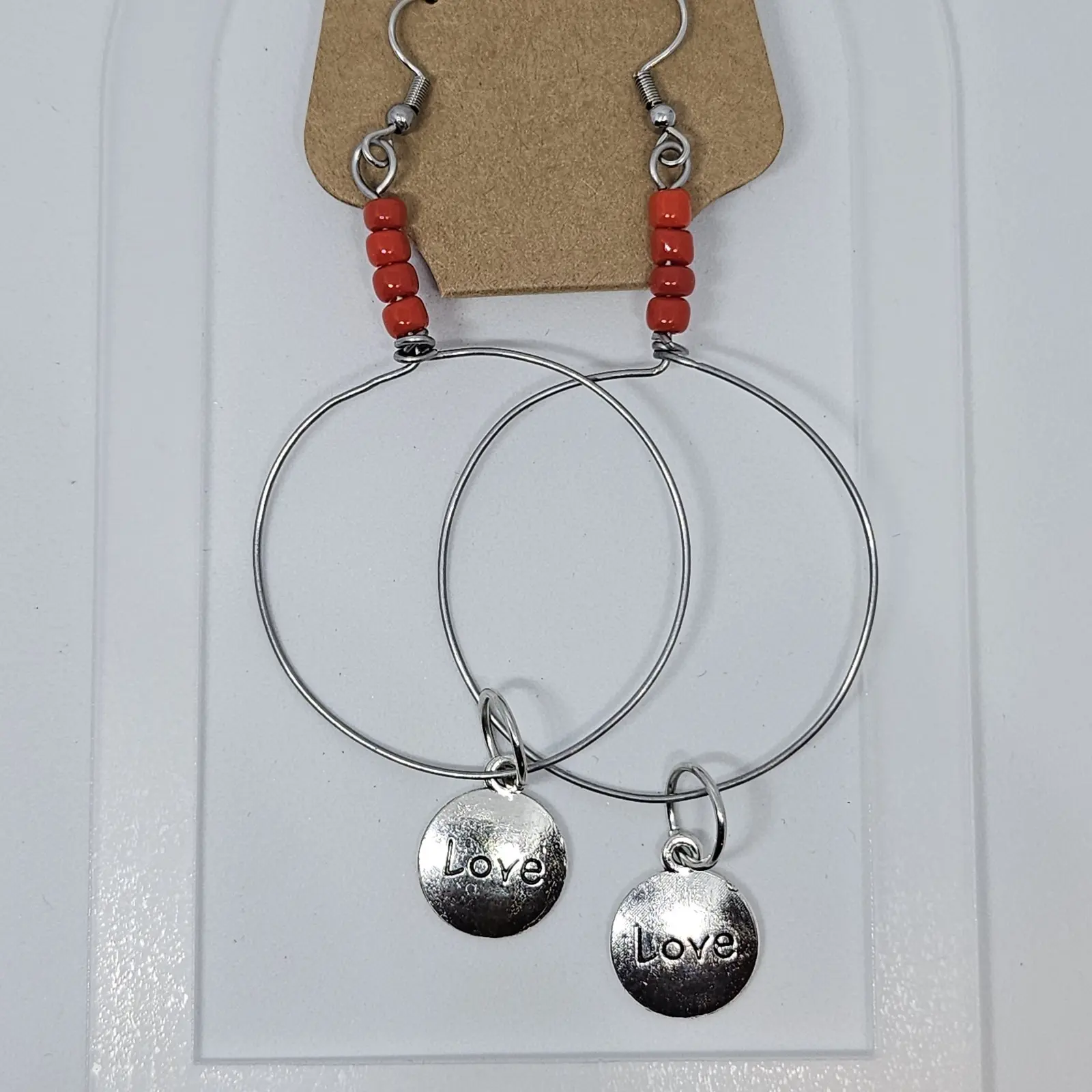 Handmade Hoop Earrings With Red Seed Beads And Love Charm