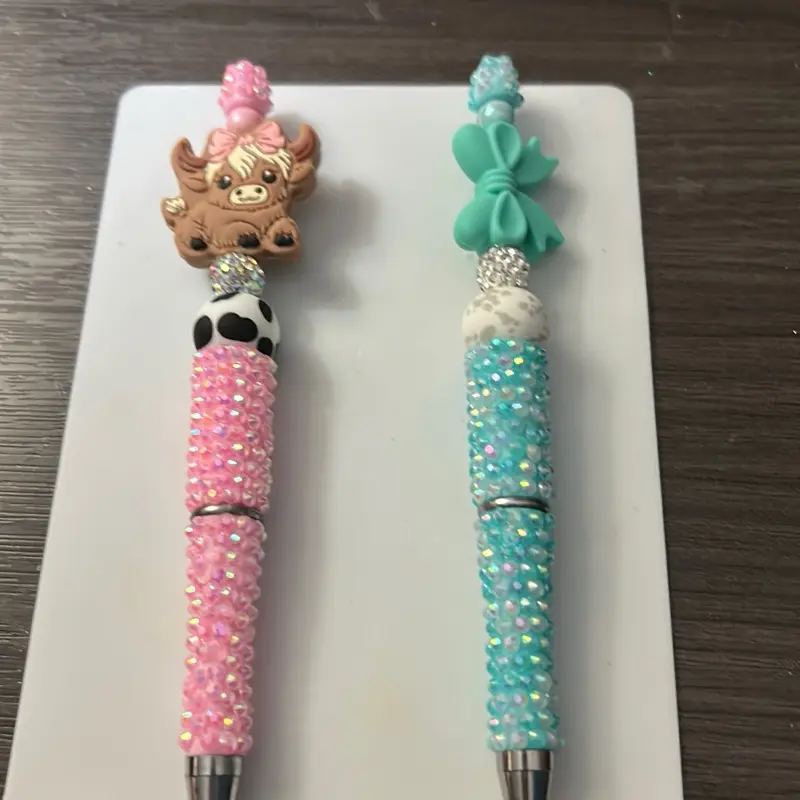 Bazzled Pens with Adorable Cow and Bow Designs Sparkling Beaded Grips for Stylish Writing