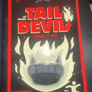 Tail Devil skateboard spark plate
