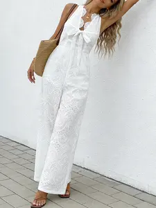 A women's bohemian style white jumpsuit with a design sense of V-neck bow and sleeveless hollow out fashion vacation style wide leg jumpsuit, suitable for summer, home, indoor, and outdoor wear Boho Womenswear Flared leg jumpsuit