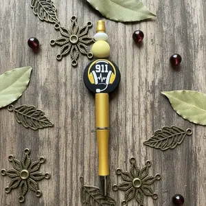 The Dispatch Life Keepsake Pen with 911 Emblem and Yellow Body for Emergency Services Enthusiasts