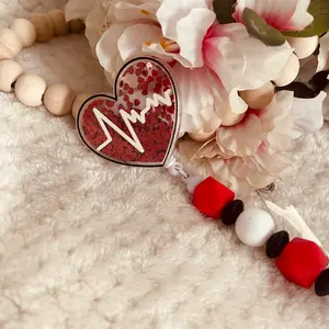 Shaker heart badge reel