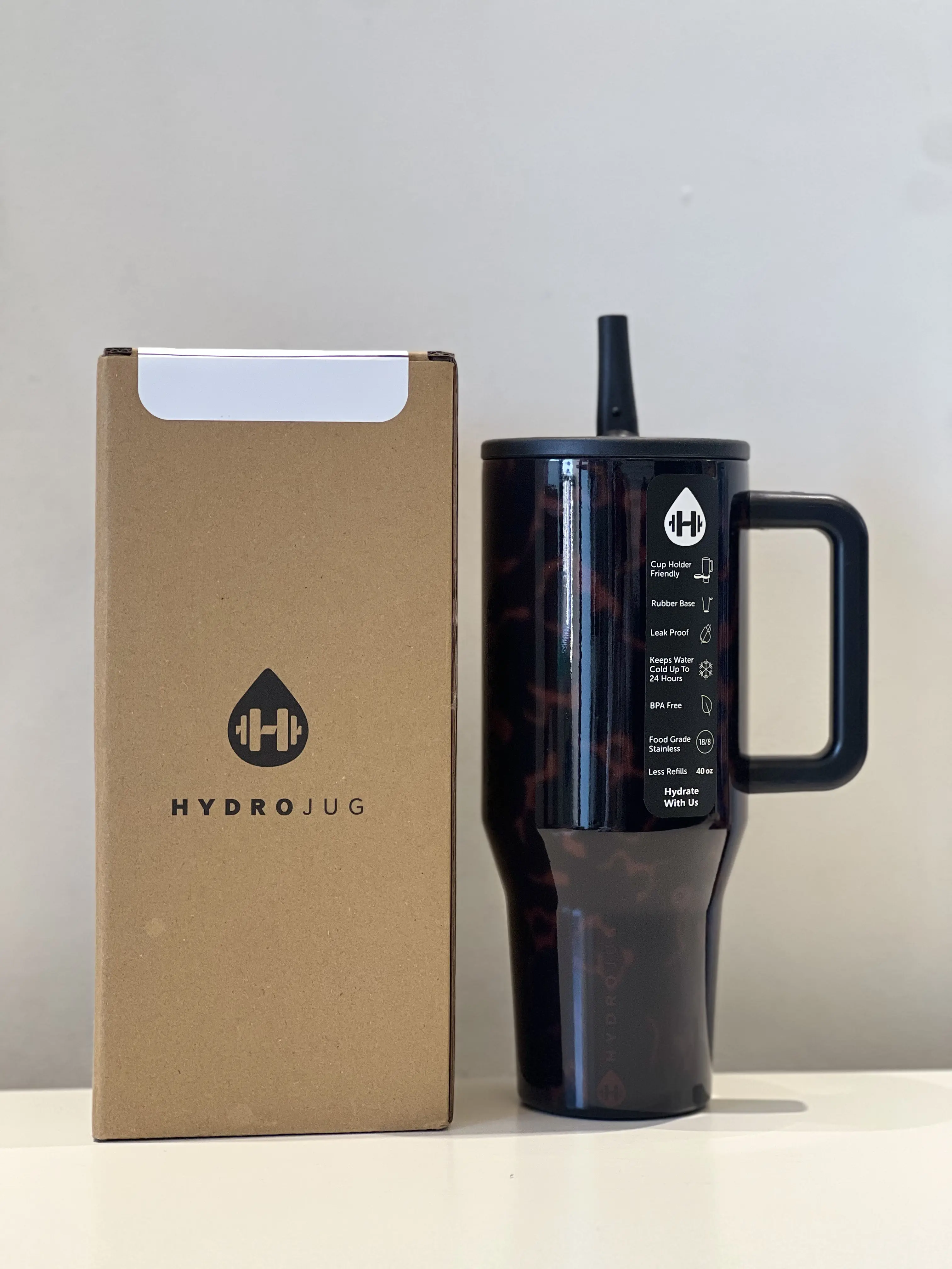 HydroJug 40oz Dark Tortoiseshell Stainless Steel Insulated Water Bottle - Leak-proof travel water bottle, keeps drinks cold for 24 hours, stylish reusable water container.