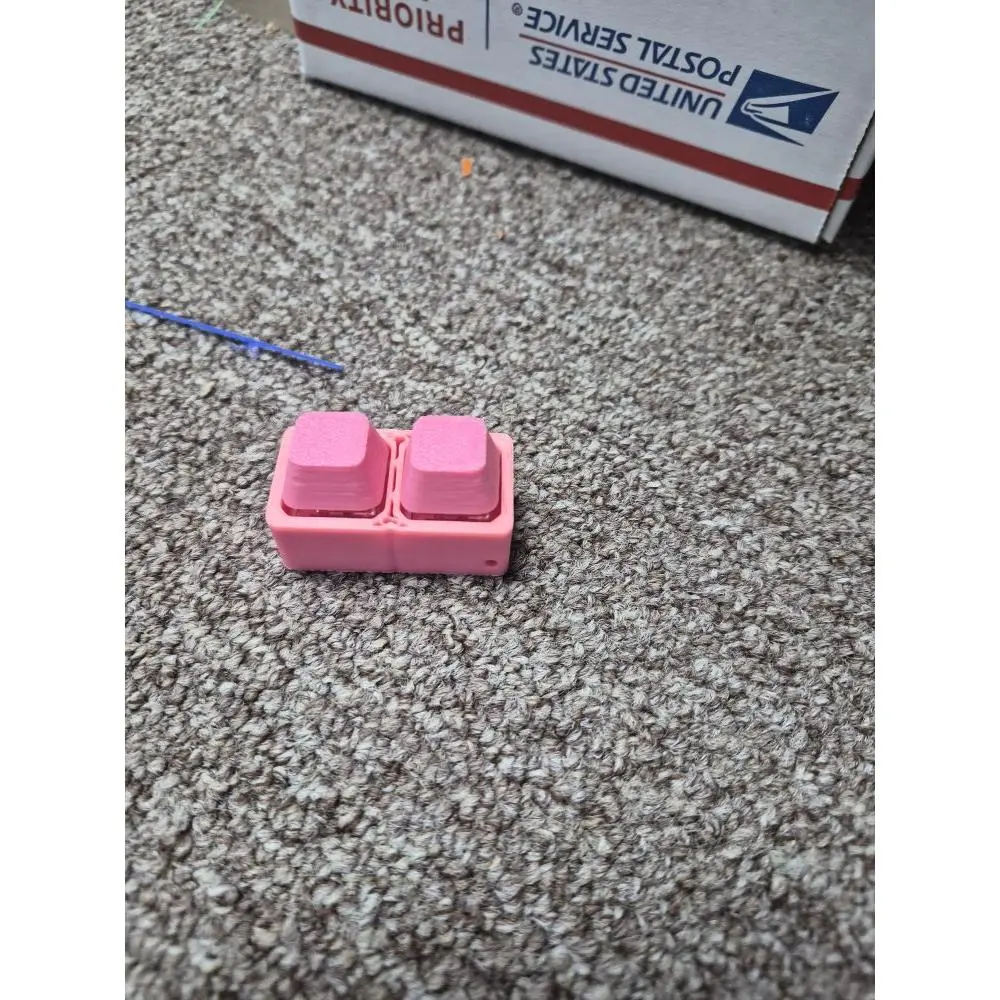 Pink Dual-Button Remote Control for Home Automation Systems