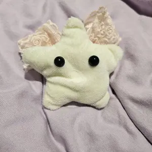 handmade star plush with bow