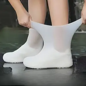 A pair of waterproof shoe covers, unisex, elastic, reusable, easy to clean, suitable for rainy days to provide waterproof and anti-slip protection in wet environments, available in various colors.