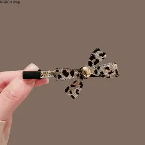 Women's Leopard Print Glitter Bow Hair Clip - Gold-Centered Sparkly Cheetah Pattern Barrette, Strong Non-Slip Grip, Lightweight Plastic Accessory for Sports & Outdoor, Camping & Hiking Hammock Use