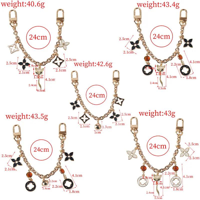 Black and White Pink Lucky Clover&Golden Ball&FoxPendant Bag Decorative Chain, Valentine's Day Gift,Mother's Day Gift Fashion Accessories Charm