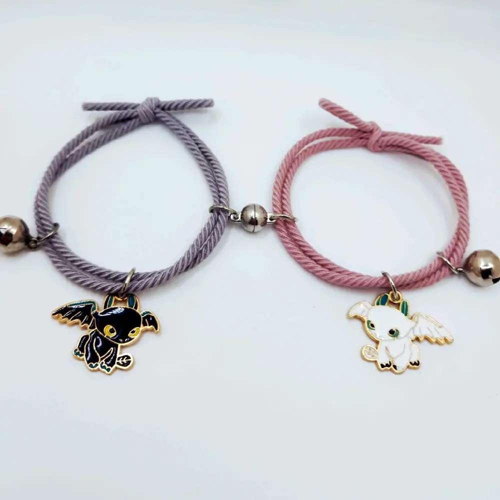 Set of Matching Couples Bracelets with Cute Charms Pink & Gray Train Dragon Bells Magnetic Design Jewelry