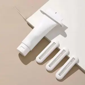 Mini Portable Toothpaste Squeezer - Easy Press Design Reduces Waste - Ideal for Hand Cream & Facial Cleanser - 2 Pack Tube Squeezer Clips - Versatile Use for Cosmetics and Paint Tubes