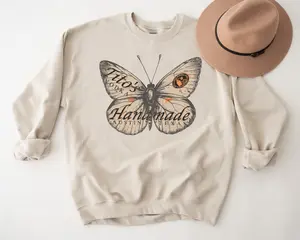 Tito's Handmade Vodka Austin Texas Label Cozy Oversized Sweatshirt with Butterfly Graphic Design