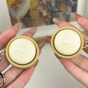 2-piece set - Simulated mini steamed bun steamer with release buttons and keychain. Stress-relieving keychain for student backpacks. Creative-shaped bag hanger decoration gift. Cute steamed bun keychain as an outlet for stress.
