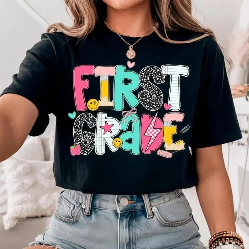 First Grade Teacher Graphic Tee Back to School Shirt Elementary Teacher Shirt Casual Cotton Short Sleeve Unisex Streetwear Fashion Top Teacher Gift Inspirational School Outfit Comfortable Everyday Wear Apparel