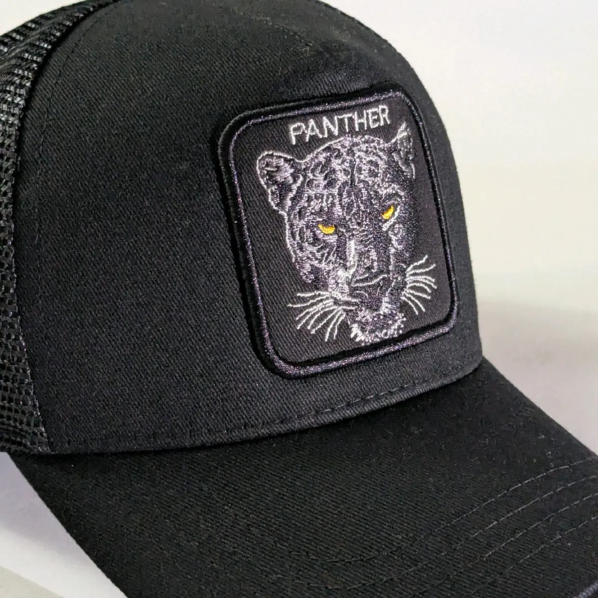 Black Panther Woven Patch Trucker Cap with Durable Design and Versatile Use