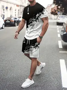 Stylish men's color-blocked print tracksuit, summer two-piece set including crew neck short-sleeved T-shirt and drawstring shorts.