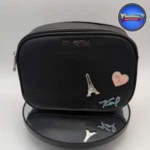 Karl Lagerfeld black crossbody bag with Eiffel Tower and heart charms - Luxury Cosmetic Bag with Unique Design and Colorful Pattern for Travel