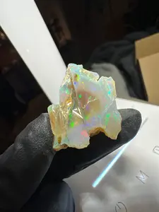 Ethiopian jewelry grade rough opal with yellow base and green/ yellow fire