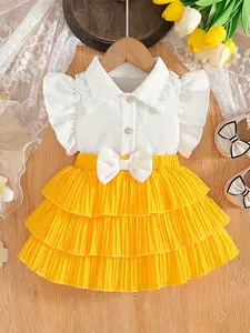 Girls' summer set, fresh contrasting lace sweet element style two-piece set, baby girl's white lace decorated bubble sleeve shirt+yellow multi-layer pleated skirt, matched with matching large bow waist accessory, children's Easter gift