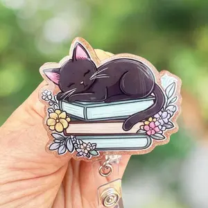 Sleeping Cat on Books Badge Reel: Acrylic Medical ID Holder