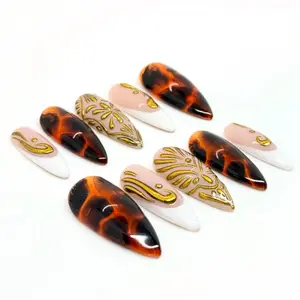 Jelly Tortoise Shell Nails with French tips and 3D Gold Chrome Detailing