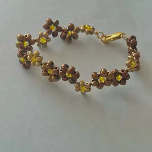 Brown & Gold Zigzag Flower Bracelet with Yellow Accents and Gold Clasp