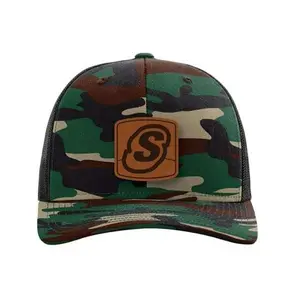 SuperSprings International | Green Camo/Black Mesh Back Trucker Hat with Leather S-Badge Patch