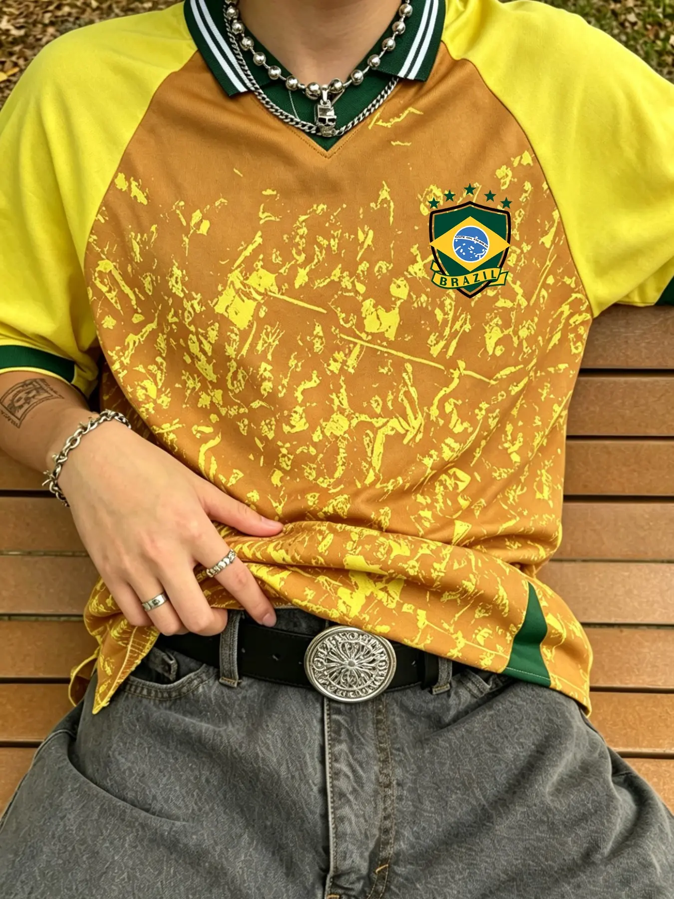 Men's graphic print collared polo shirt, Sporty polo top, with bold yellow and green color scheme and Brazilian flag elements, perfect for football fans. Made with quick-drying fabric, it's suitable for everyday wear, including football games